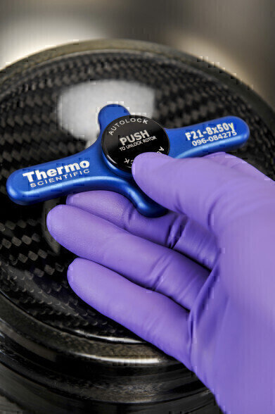 How does Thermo Scientific Auto-Lock rotor exchange facilitate rotor placement and improve safety?
