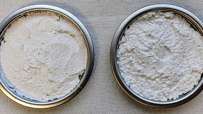 Grain by grain: How particle composition influences the workability of scratch plaster