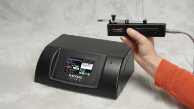 Delivery System for Hand-Held or Stereotaxic Mounting