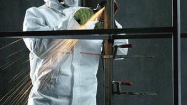A New Coverall Protecting User and Flame Resistant Garment