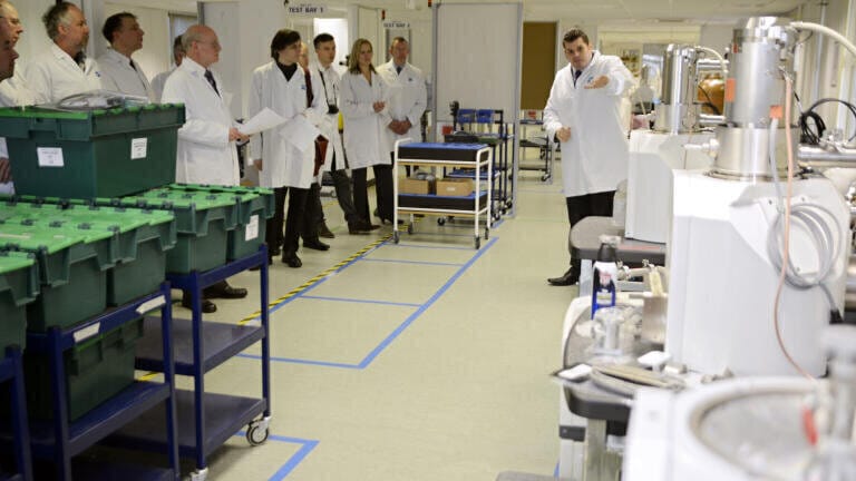 Daren Sheward, Operations Manager, leads a tour of EVO scanning electron microscope production line