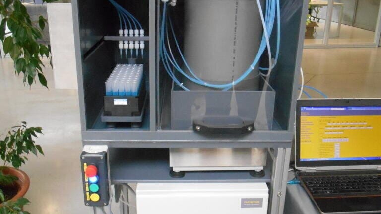 Automated reagent dispenser system