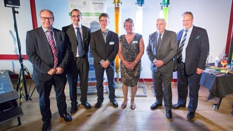 •	Image 139 – from left to right: Derek Vaughan MEP, Shaun Richardson and Robin Shields (EnAlgae project, Swansea University), Linda Gillham (Committee of the Regions), Prof Ian Cluckie (Swansea University Pro-Vice-Chancellor), Nick Wood-Dow (Chelgate Ltd).