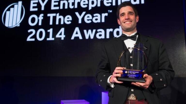 Jonathan Golby accepts the award on behalf of Robin MacGeachy