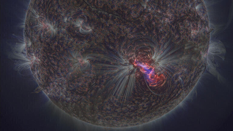 This dramatic image, captured by the orbiting Solar Dynamics
Observatory, shows one of the most active sunspot groups
observed in the last few decades. Solar active region AR2192
was the source of six solar flares of the largest class (X-class) in
October 2014. This image was gathered in extreme ultraviolet
wavelengths - 193 ångstroms in blue, 171 ångstroms in white
and 304 ångstroms in red (one ångstrom is a ten billionth of
a metre). The UV light comes from highly ionised helium and
iron atoms in the Sun’s outer atmosphere, and shows very
clearly how the atoms congregate along the intense magnetic
field lines. The rest of the Sun’s surface, so bright to our eyes,
appears dark at such extreme wavelengths. This exceptionally
sharp image was created by processing the raw data using special software called NAFE. Credi: NASA/SDO/AIA, processing by Miloslav Druckmuller