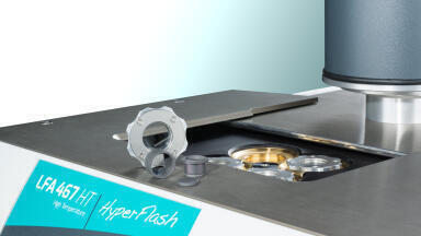 Light Flash Apparatus for Determining Thermal Diffusivity and Conductivity beyond 1250°C