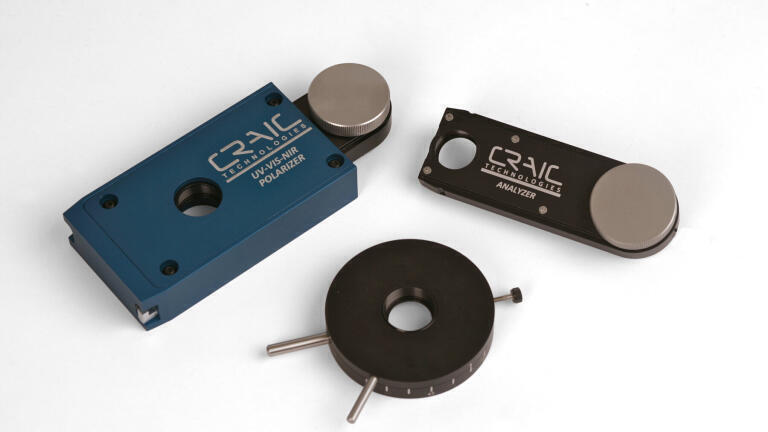 UV-Visible-NIR Polarisation Spectroscopy of Microscopic Samples