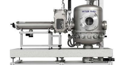 New Vacuum Mass Comparator to Support the Redefined Kilogram