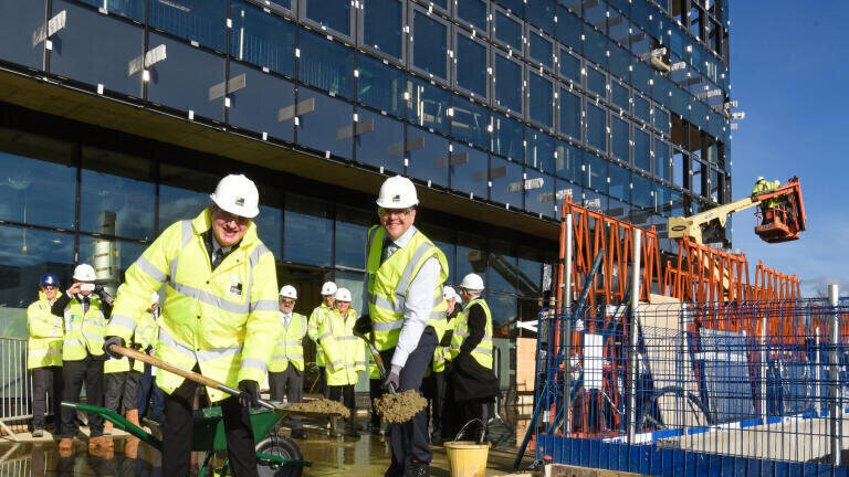 Finishing Touch Marks Progression of New Institute