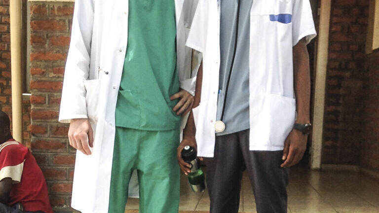 Andrew Duncan with Mphatso, a clinical officer in Malawi
