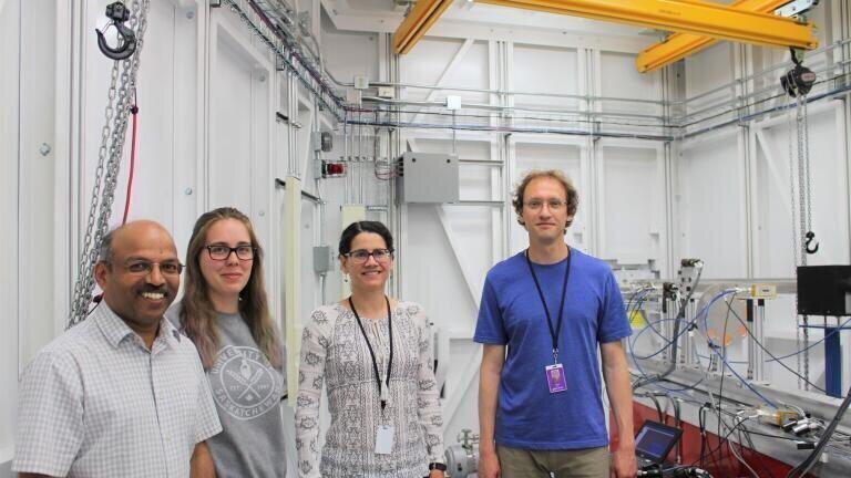 Pictured: Narayan Appathurai, Chelsea-Lea Randall, Beatriz Moreno, and Graham King at the beamline (Credit: CLS)