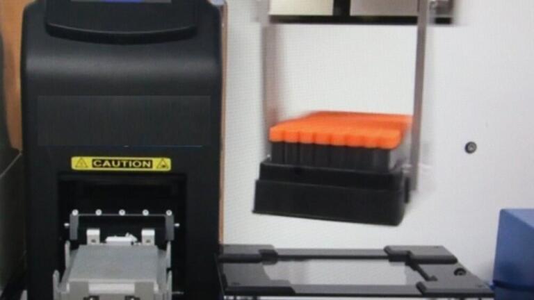 Ziath Mirage camera-based 2D barcode tube reader in action on STRIP-1 Robot system.