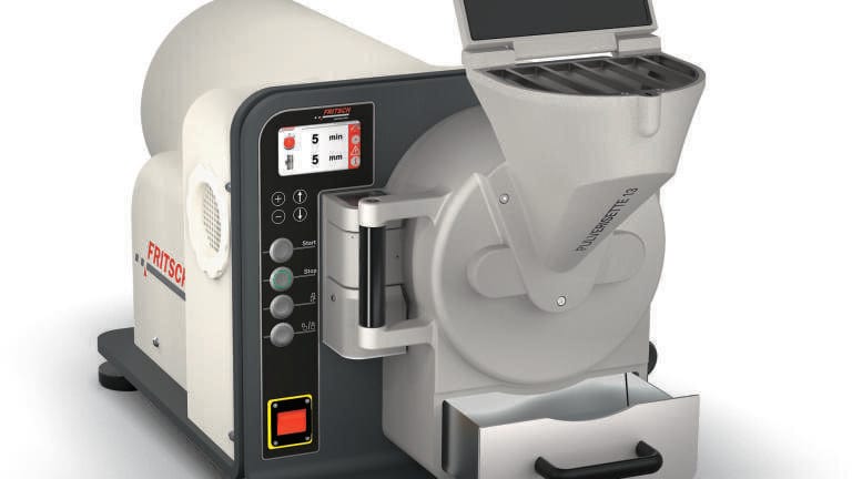The Disk Mill PULVERISETTE 13 premium line with large funnel, smooth inner surfaces and flow-optimised transition areas for optimal material feeding.