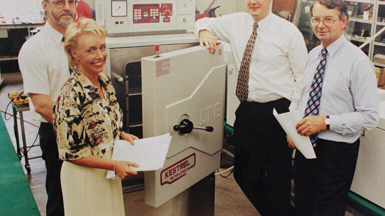 Senior Management with a 1998 LTE Kestrel Autoclave, from left to right: Trevor Lord (Former Production Manager), Kim Cooper (Director), John Lees (Sales Director – Now Managing Director), Colin Perry (Former Chairman)