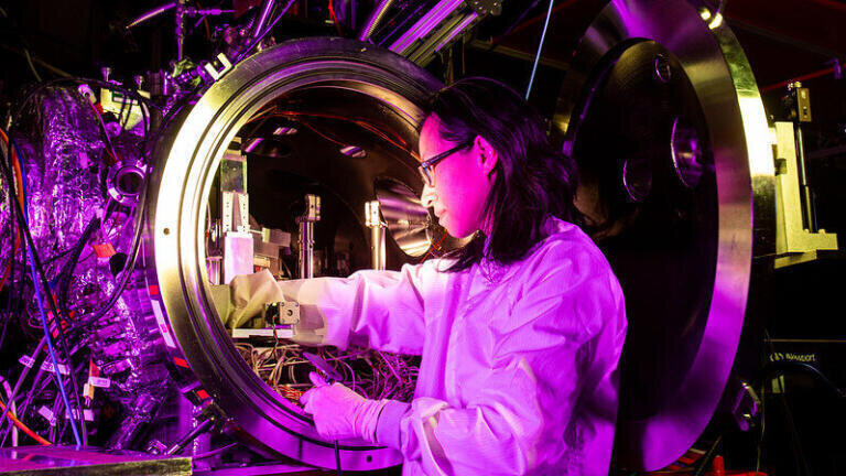 Kayla Ninh at the Liquid Chemistry Inelastic X-ray Scattering instrument in the Near Experimental Hall. (Jacqueline Ramseyer Orrell/SLAC National Accelerator Laboratory)