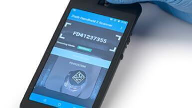 Portable 2D barcode tube reader