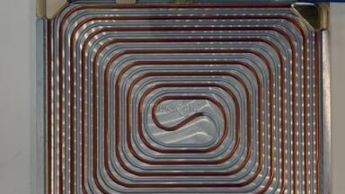 Tube-in-plate reactor for synthetic chemistry