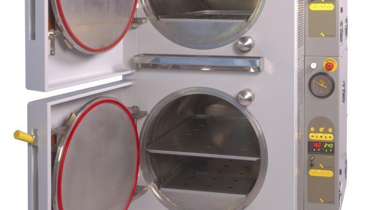 Dual-chamber stacked autoclaves for efficient sterilisation