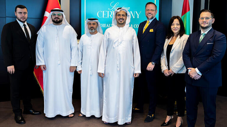 Leaders and guests gather at the signing ceremony. Credit: E H G Drug Store LLC t/a EarlyHealth Group
