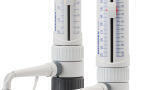 Bottle-top dispensers for precision liquid dispensing
