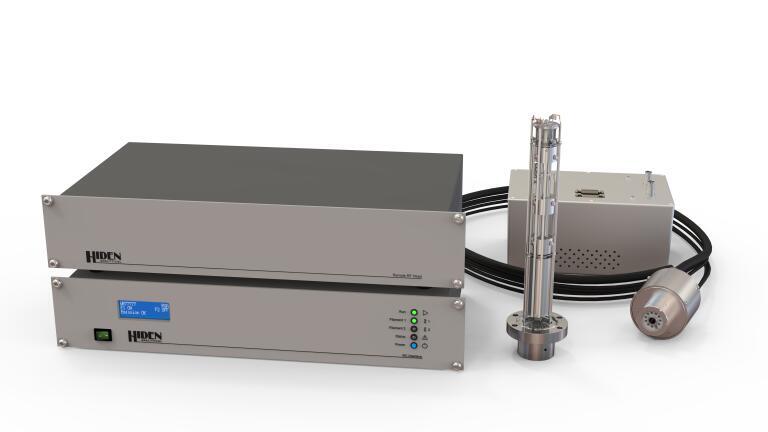 Dual-zone mass spectrometry for nuclear fusion gas analysis